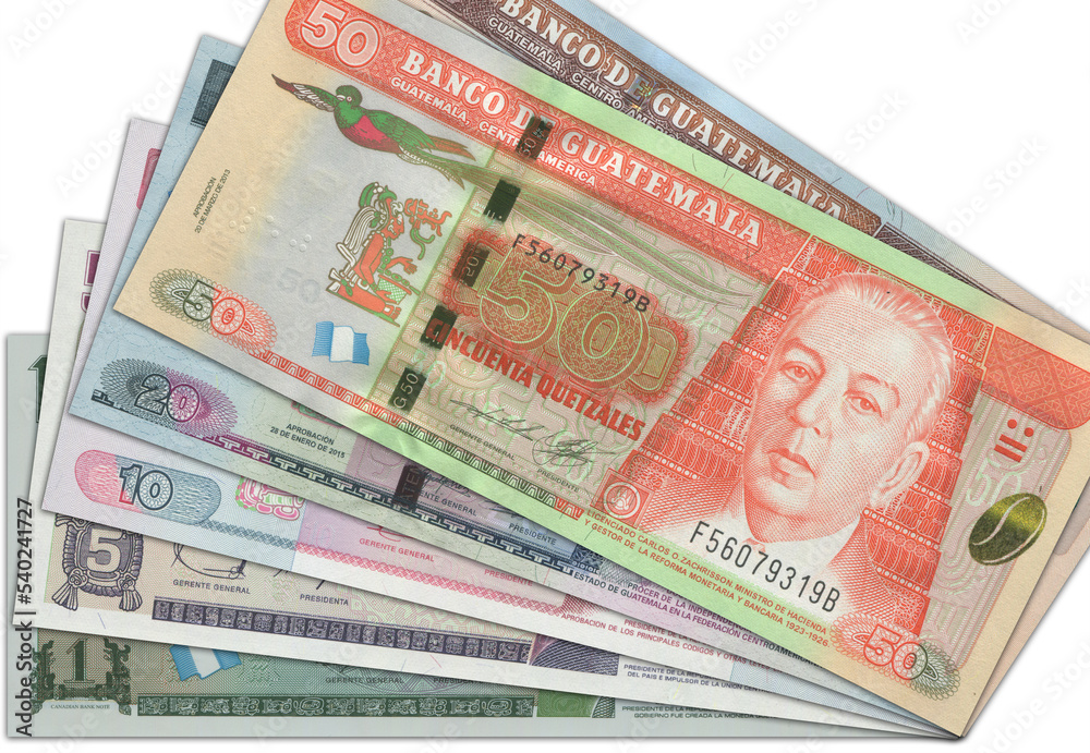 Paper money from Guatemala. Guatemalan quetzal. Close up banknotes from Guatemala. Guatemalan currency Paper money from Guatemala. Guatemalan quetzal. Close up banknotes from Guatemala. Guatemalan currency