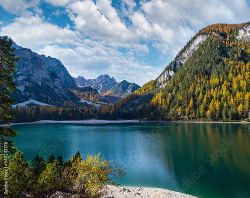Fototapeta Naklejka Na Ścianę i Meble -  Autumn peaceful alpine lake Braies or Pragser Wildsee. Fanes-Sennes-Prags national park, South Tyrol, Dolomites Alps, Italy, Europe.