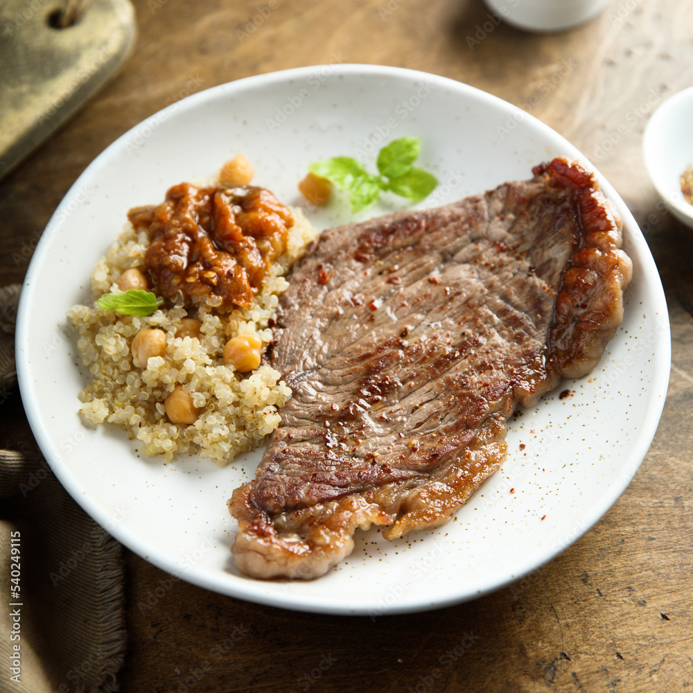 Beef steak with chickpea and vegetable sauce