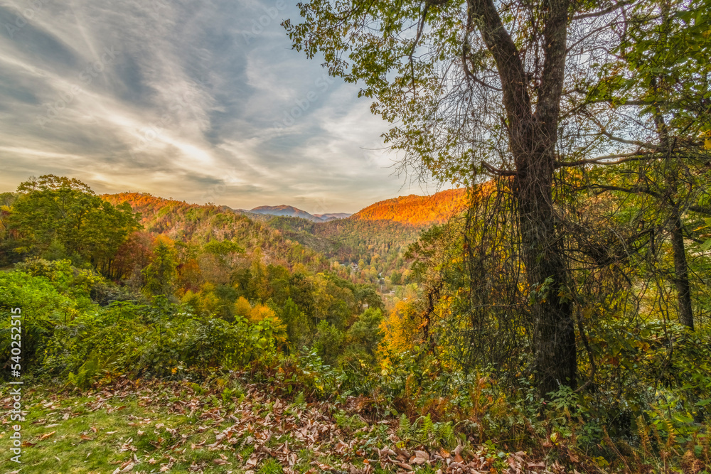 Autumn colors mountain tops to valleys below and colorful sky as the sun sets in the Grate Smoky Mts., in Cherokee co. NC. Orange, yellow, blue, red, brown, Horizontal, Photo, Photograph Art