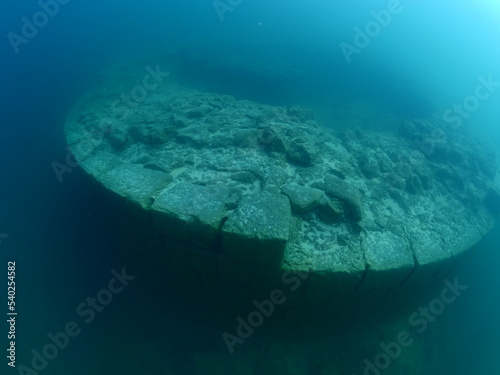 antic walls of urartian asurian castle underwater in lake van turkey photo