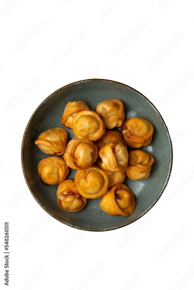 Obraz premium Fried dumplings in a bowl. Isolated on white. View from above. transparent