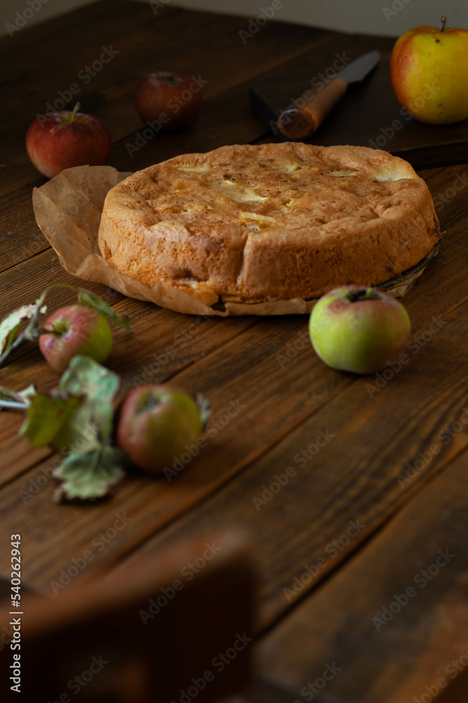 apple pie on a wooden rustic background apple pie on a wooden rustic background