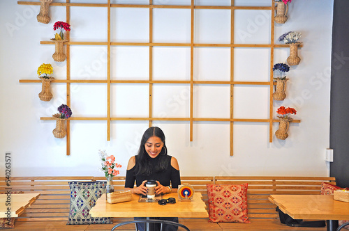 Woman sitting in a cafe