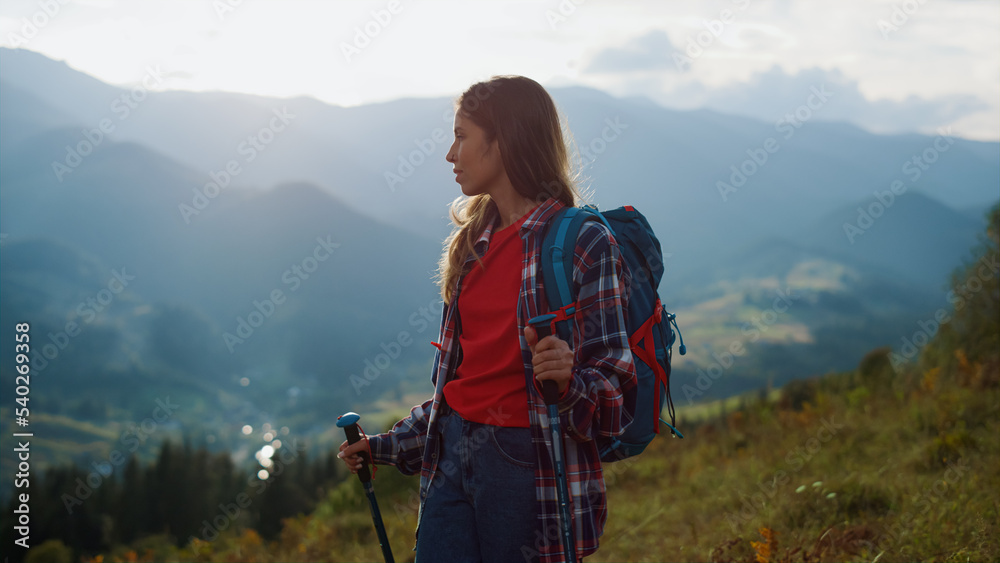 Thoughtful woman explore nature. Hiking girl travel mountain landscape close up.