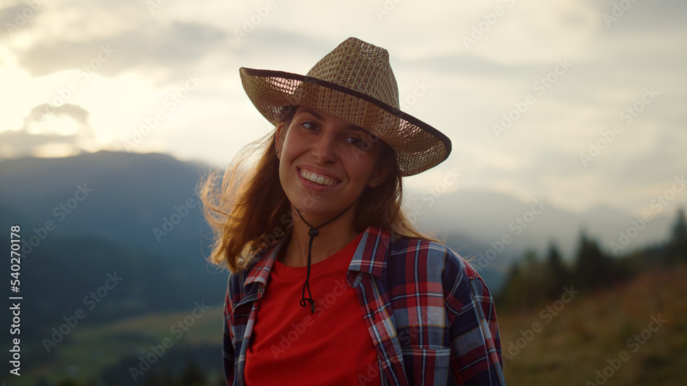 Cheerful woman enjoy nature on mountains hill closeup. Happy girl enjoy weekend.