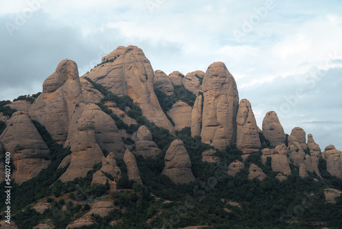 Montserrat in a cloudy conditions during the late summer season. Barcelona Catalonia Spain. High quality photo