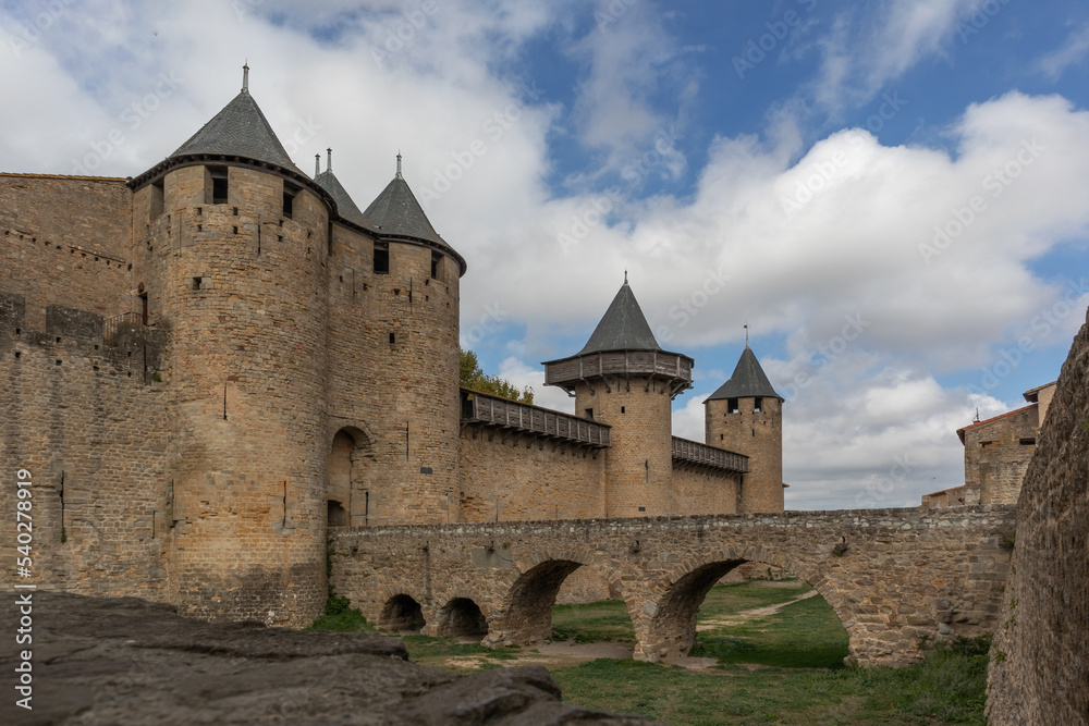 Chateau Comtal is a large restored 12th century castle with a museum on a hilltop in the famous medieval city of Carcassonne.