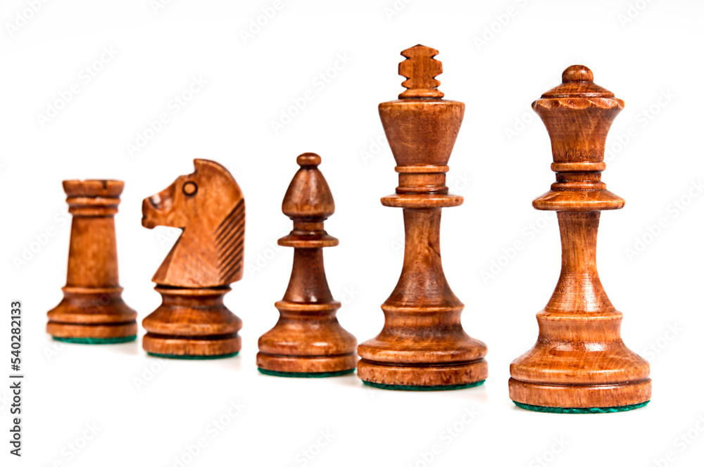 set of black chess pieces in a row