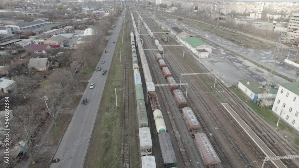 drone video. freight and passenger trains following the railway tracks drone video. freight and passenger trains following the railway tracks