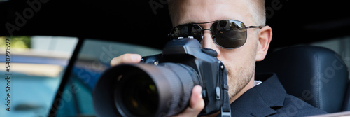 Fotografie Man Photographing With SLR Camera