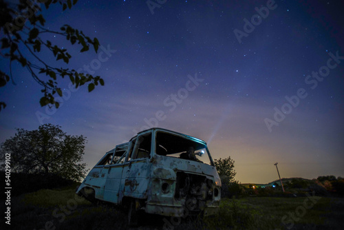 night under the stars, abandoned car, rotten van