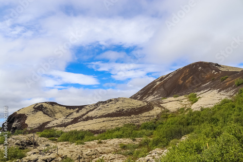 Unreal volcanic landscape in Iceland with steaming rocks on the Grabok volcano.