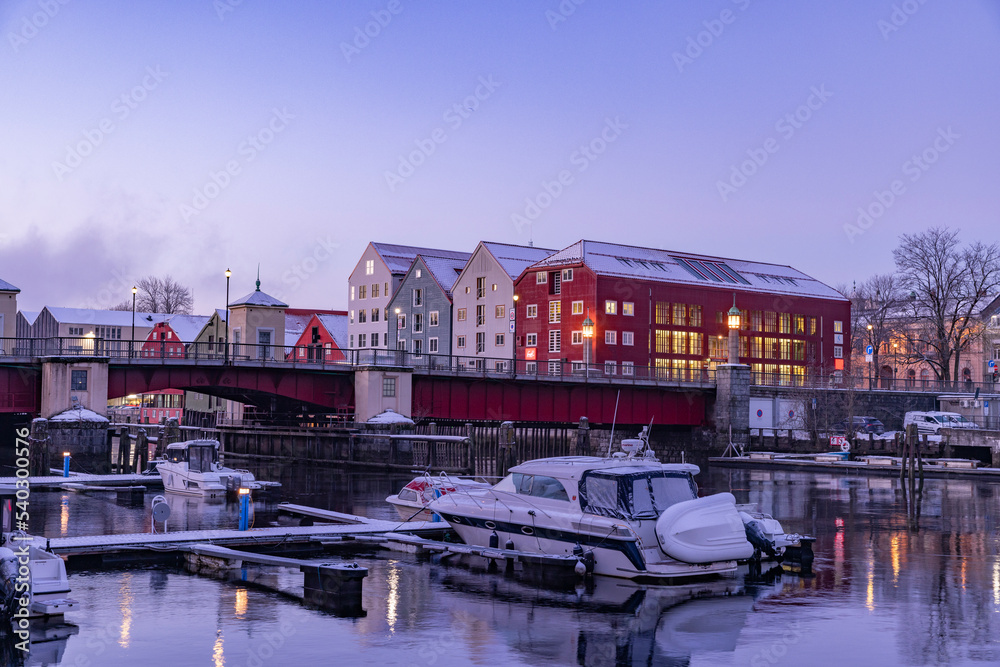 Walking along the Nidelven (river) on a cold winter's day in Trondheim city, Trøndelag, Norway