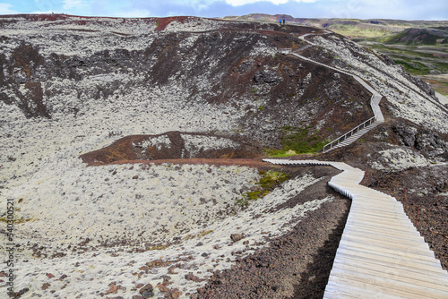 Unreal volcanic landscape in Iceland with steaming rocks on the Grabok volcano.