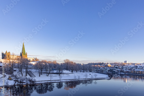 Walking along the Nidelven (river) on a cold winter's day in Trondheim city, Trøndelag, Norway