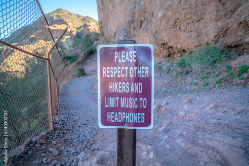 Camelback Mountain, Phoenix, Arizona- Signage for hikers to limit music to headphones on a trail