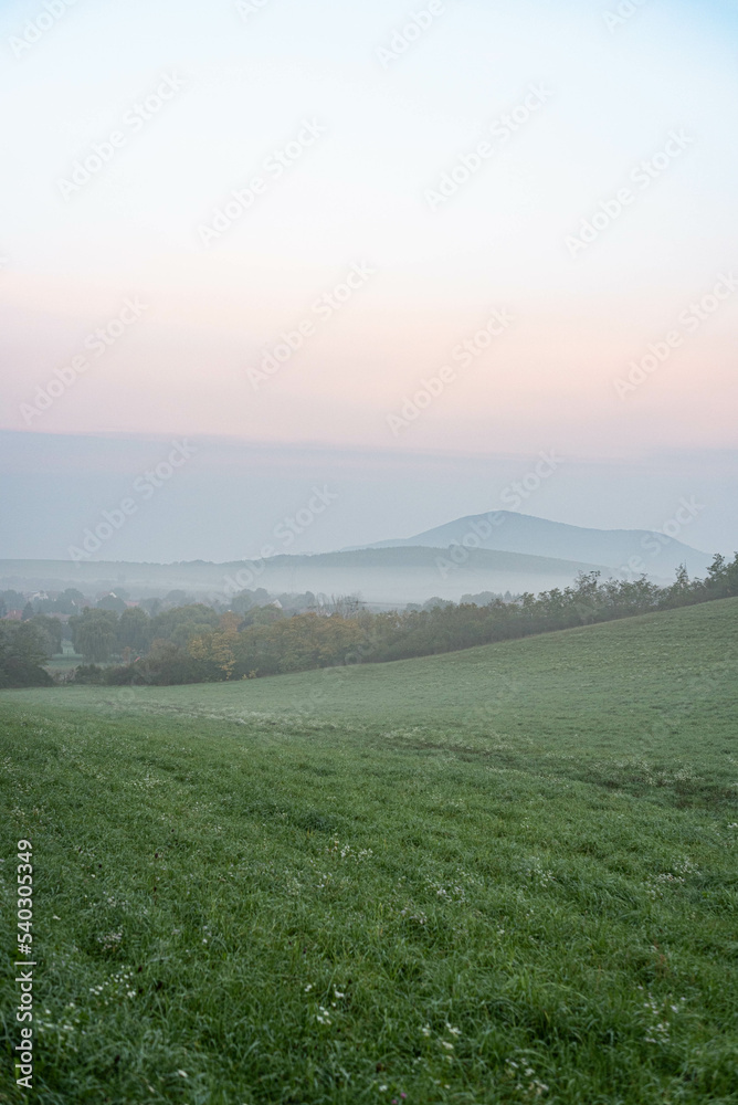 Obraz premium Foggy autumn morning in the countryside, agricultural fields