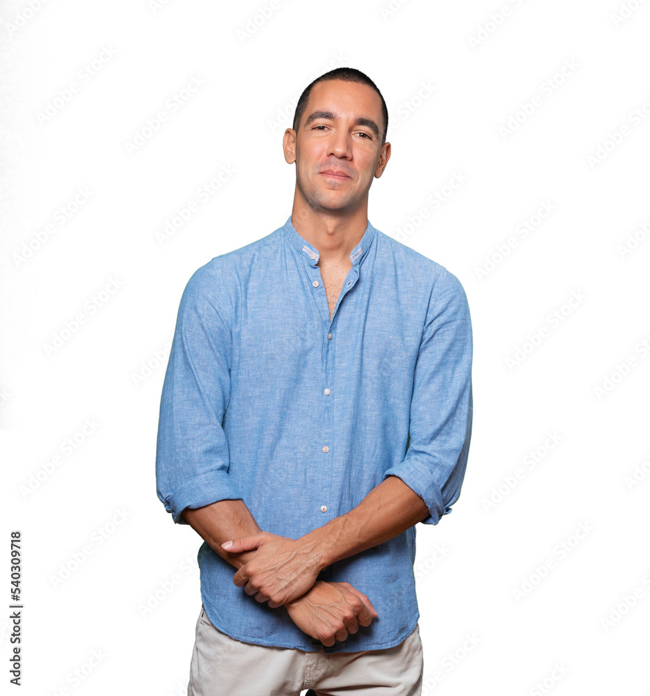 Happy young man posing against background Happy young man posing against background