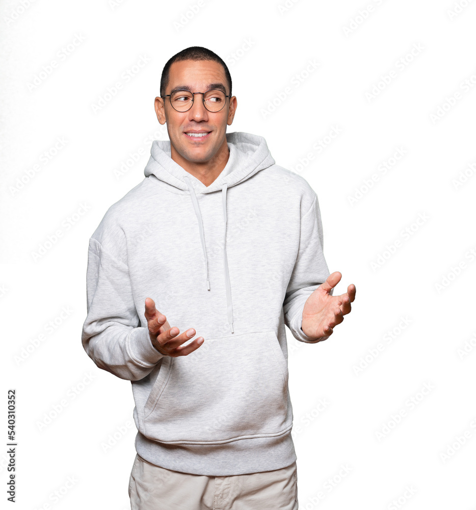 Amazed young man looking up gesture Amazed young man looking up gesture