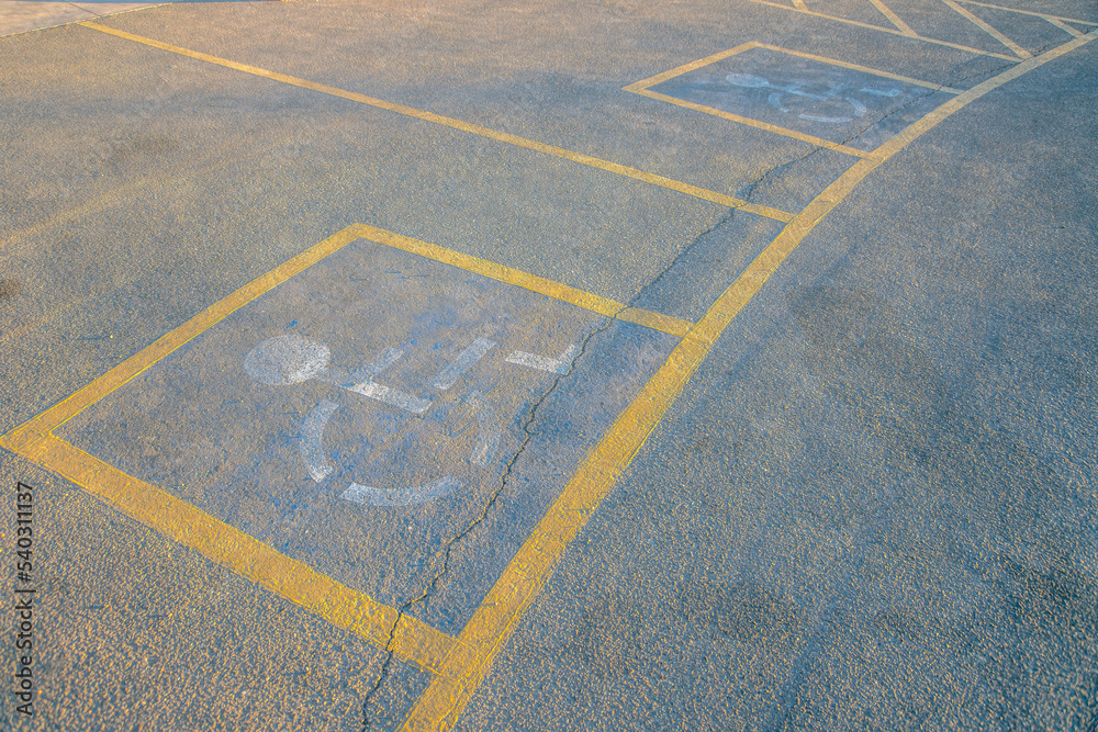Fototapeta premium Camelback Mountain, Phoenix, Arizona- Parking lot sign for disabled on a concrete pavement