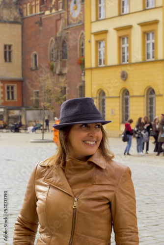 portrait of a happy woman in wroclaw city, poland	