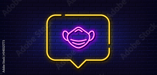 Neon light speech bubble. Medical mask line icon. Safety breathing respiratory mask sign. Coronavirus face protection symbol. Neon light background. Medical mask glow line. Brick wall banner. Vector