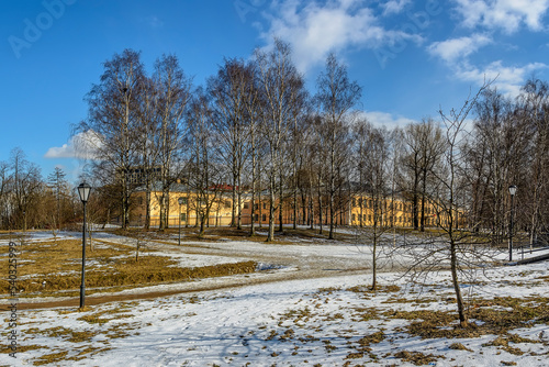 Old apple orchard in Kurakina Dacha park in St. Petersburg in early spring.