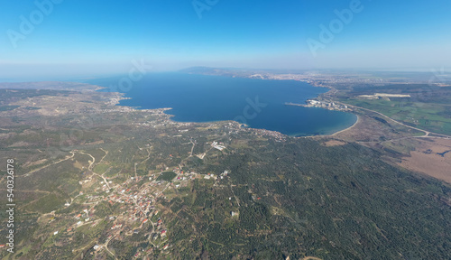 Aerial view of Erdek Kapidag peninsula and bay from top with blue sky and sea