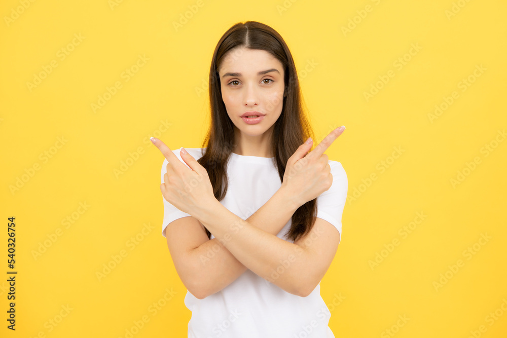 Woman point at copy space, showing copyspace pointing. Promo, girl showing advertisement content gesture, pointing with hand recommend product. Isolated background. Woman point at copy space, showing copyspace pointing. Promo, girl showing advertisement content gesture, pointing with hand recommend product. Isolated background.