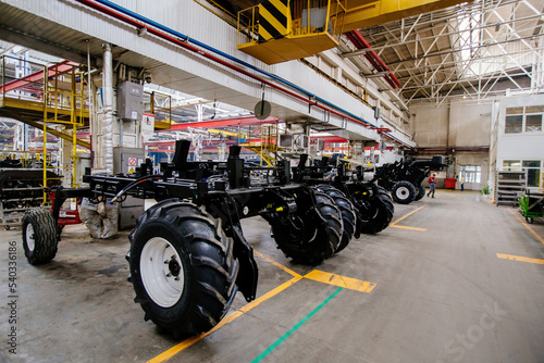 The process of assembling agricultural tractors and harvesters photo