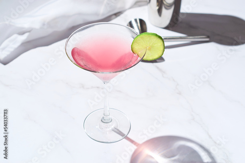 An alcoholic cosmopolitan cocktail photo