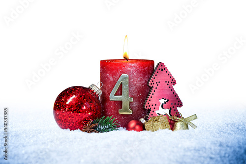 fourth sunday of advent red candle with golden metal number tfour red decoration one on snow isolated background