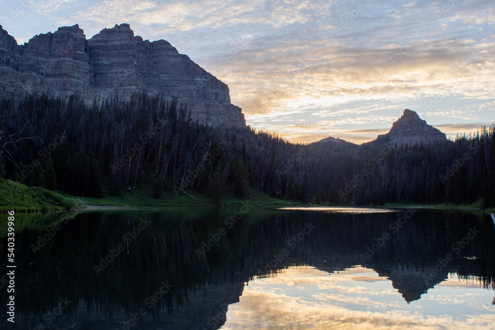 Sunset in mountains over lake