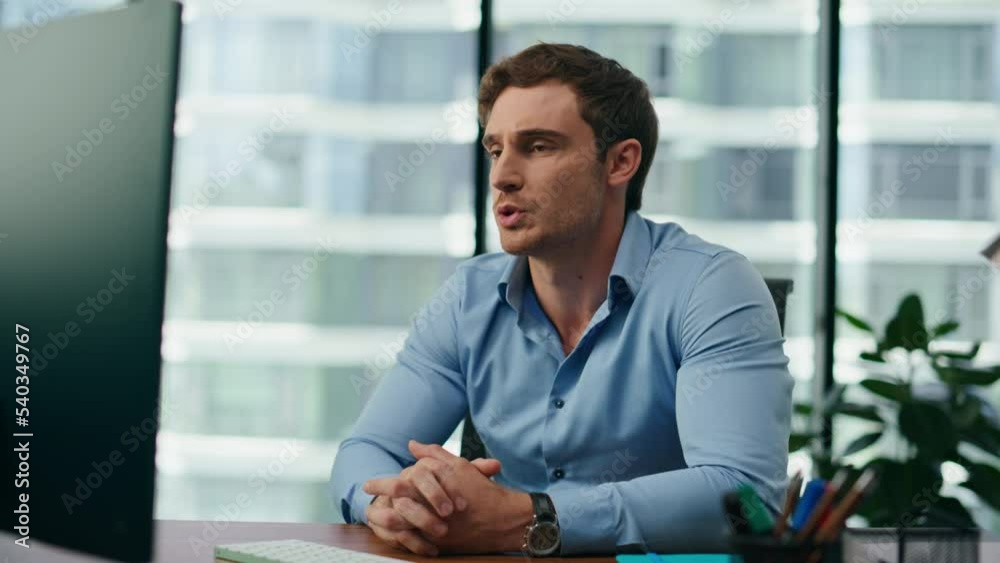 Businessman have video call sitting office desk close up. Manager talking online Businessman have video call sitting office desk close up. Manager talking online