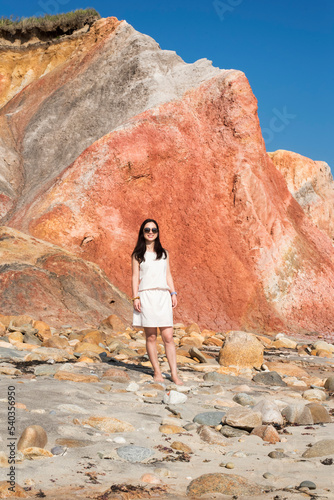 happy chinese woman at gayhead cliffs Martha's Vineyard photo