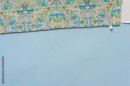paper background featuring fancy envelope liners and scrapbook paper with dots