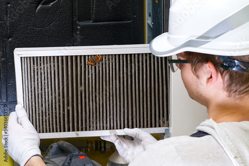 Foto hvac filter replacement home central air system