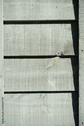 detail of a wood shed - clapboard siding