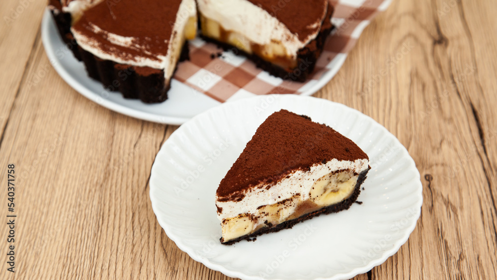 Banoffee pie, banana and caramel with biscuit and fresh cream Banoffee pie, banana and caramel with biscuit and fresh cream