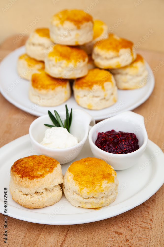 Homemade British Scones with clotted cream and raspberry jam 