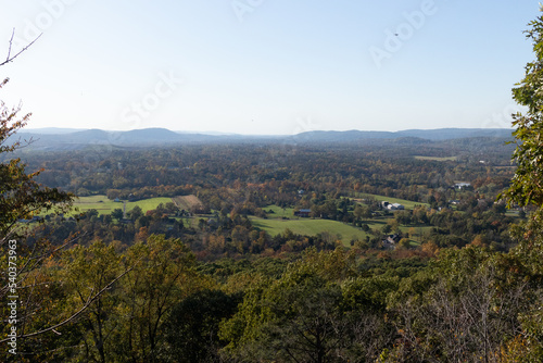 Fototapeta Naklejka Na Ścianę i Meble -  The top of Monocacy hill with a beautiful view across the valley. I love the look of the leaves turning brown for the Fall season. All of the plants are starting to slip into their Autumn slumber.
