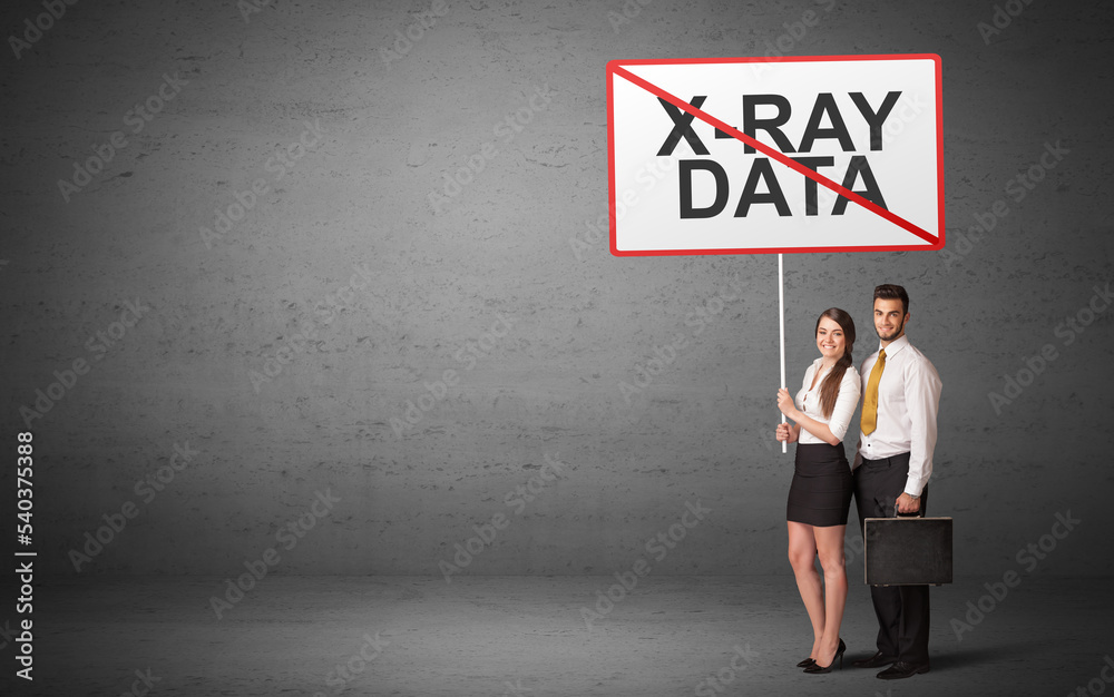 business person holding a traffic sign business person holding a traffic sign