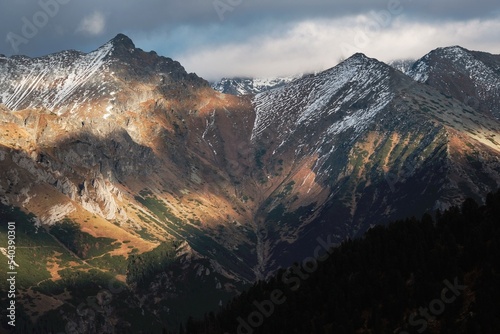 Peaks of the Slovak High Tatras in the evening light, view from blue trail to Sea Eye pond (Morskie Oko), Carpathians, Poland