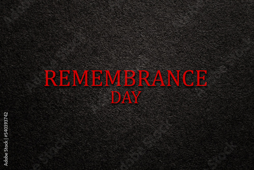 Text Remembrance Day on black textured background. Remembrance Day, Memorial Day, Anzac Day in New Zealand, Australia, Canada and Great Britain.