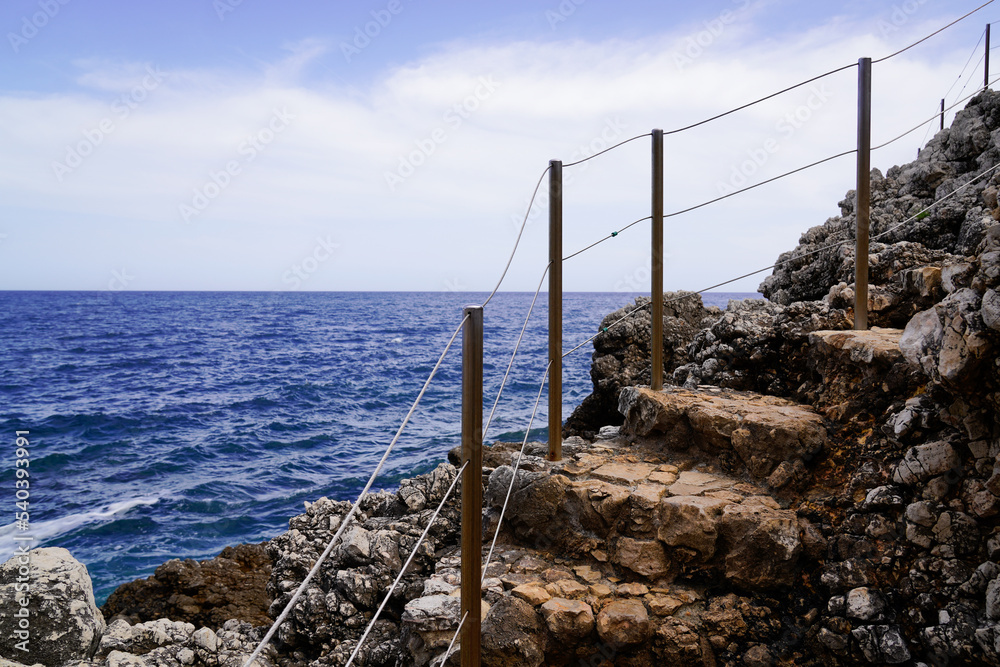 mediterranean stairs pathway fence in south Antibes southeast coast paca in France mediterranean stairs pathway fence in south Antibes southeast coast paca in France