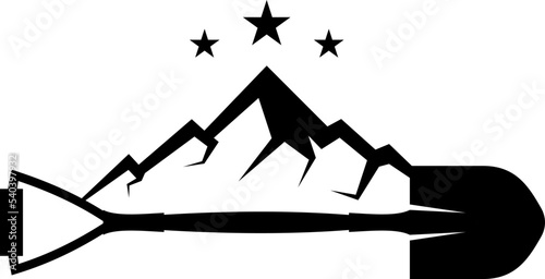 shovel with mountain on the top