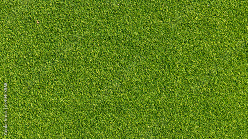 Artificial grass carpet background. Artificial grass. Green grass. natural background texture. fresh spring green grass.