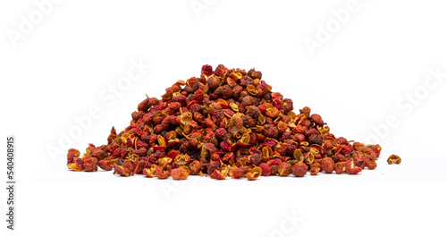 Sichuan hoju pepper. Pepper close-up on a white background. Spices of China, Tibet, Japanese pepper Huajiao. Seasoning for dishes. Additive for the preparation of delicious delicacies. Sauces set. photo