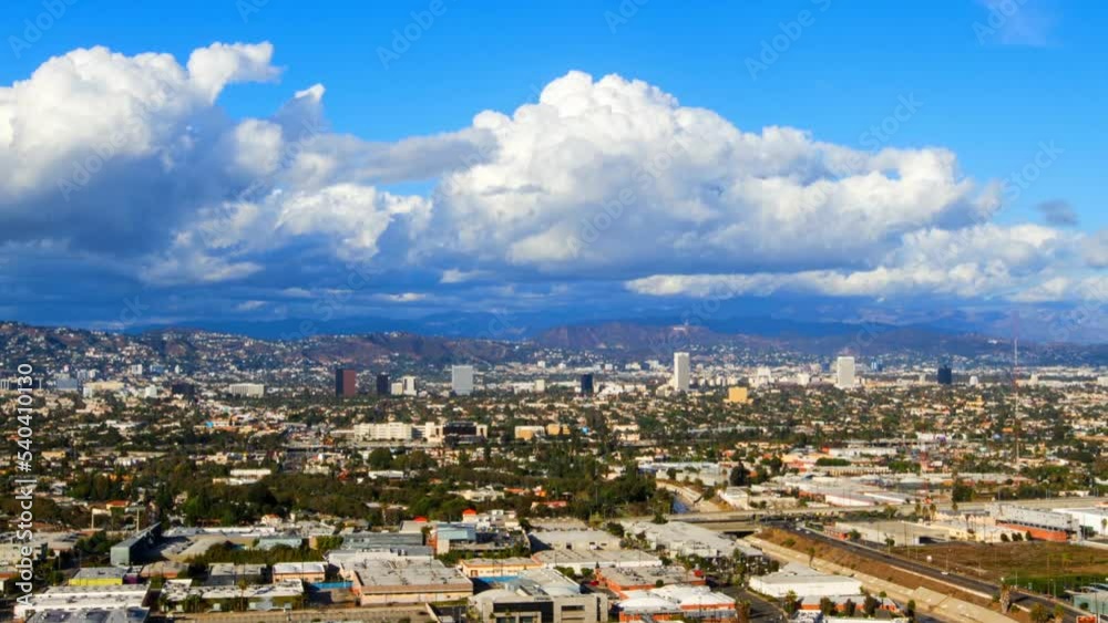 Aerial Time Lapse Lockdown Shot Of Cloudscape Over Residential City On Sunny Day - Los Angeles, California Aerial Time Lapse Lockdown Shot Of Cloudscape Over Residential City On Sunny Day - Los Angeles, California